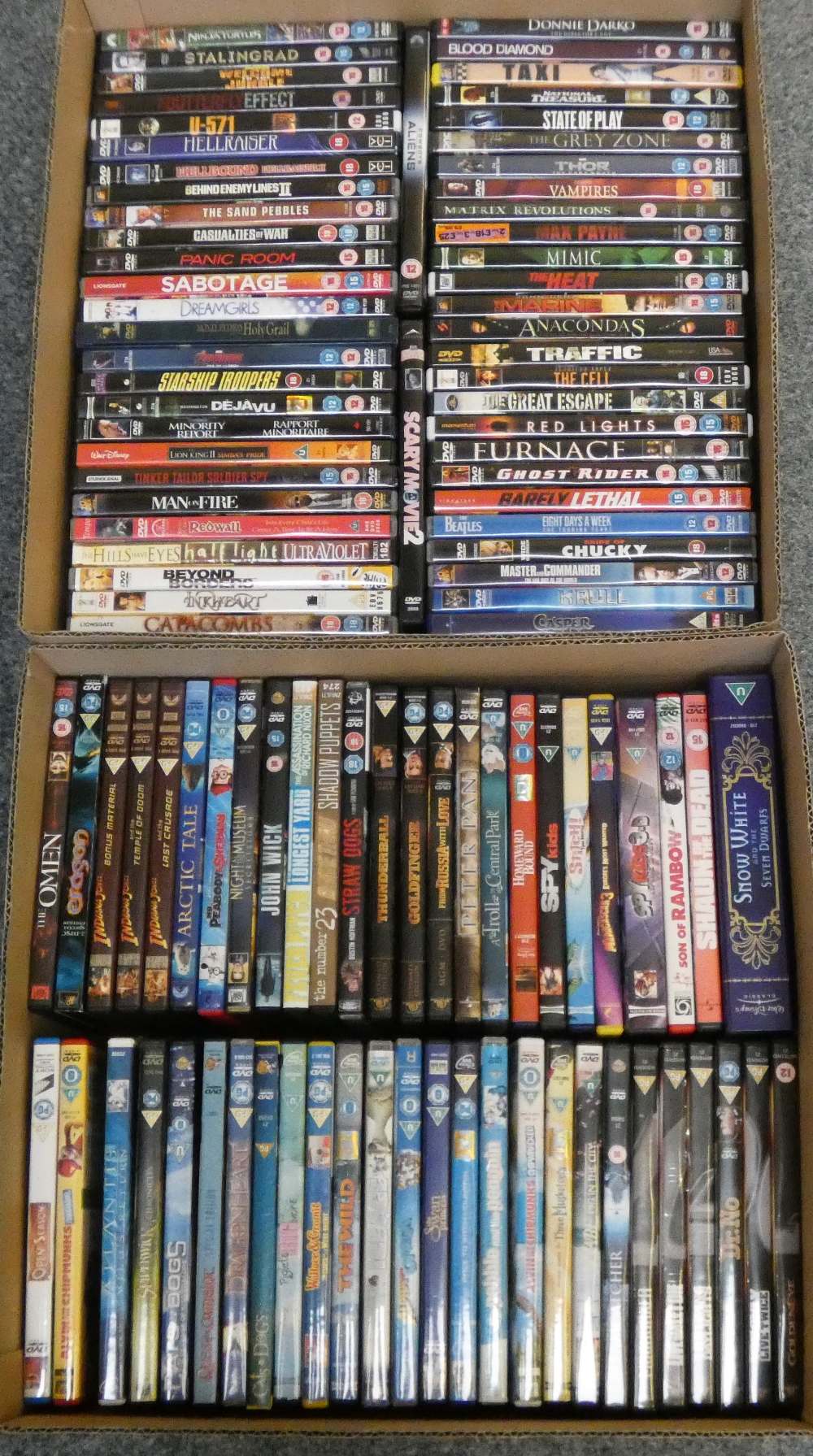 Two boxes of DVDs