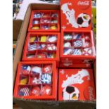 Approximately twenty seven boxed sets of coca cola world cup badges