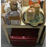 A pair of stoneware jars marked 'Hey Brothers, Pontefract', together with a pair of trays a large