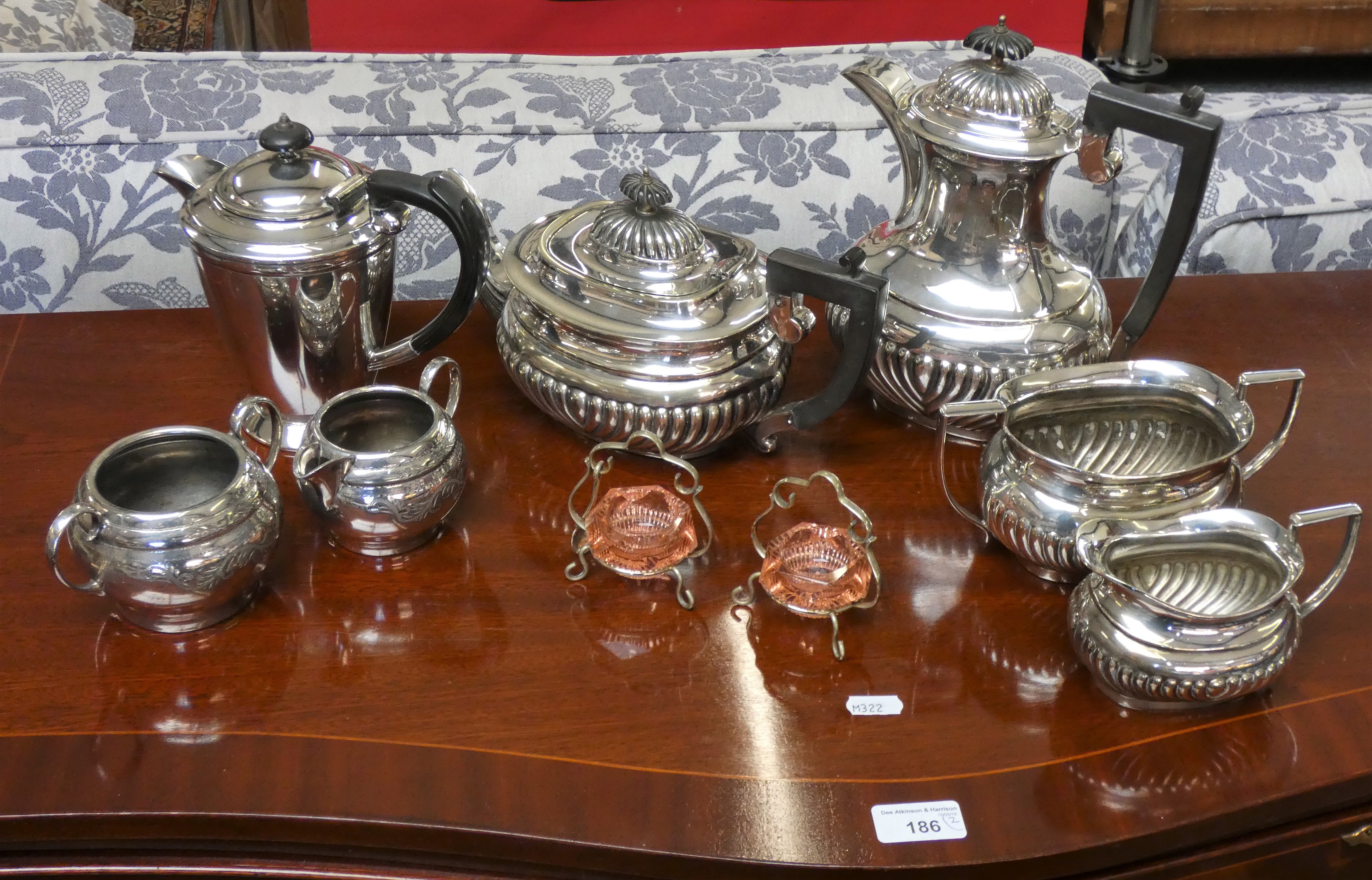 A four piece electroplate tea service, three other plated items and a pair of glass salts