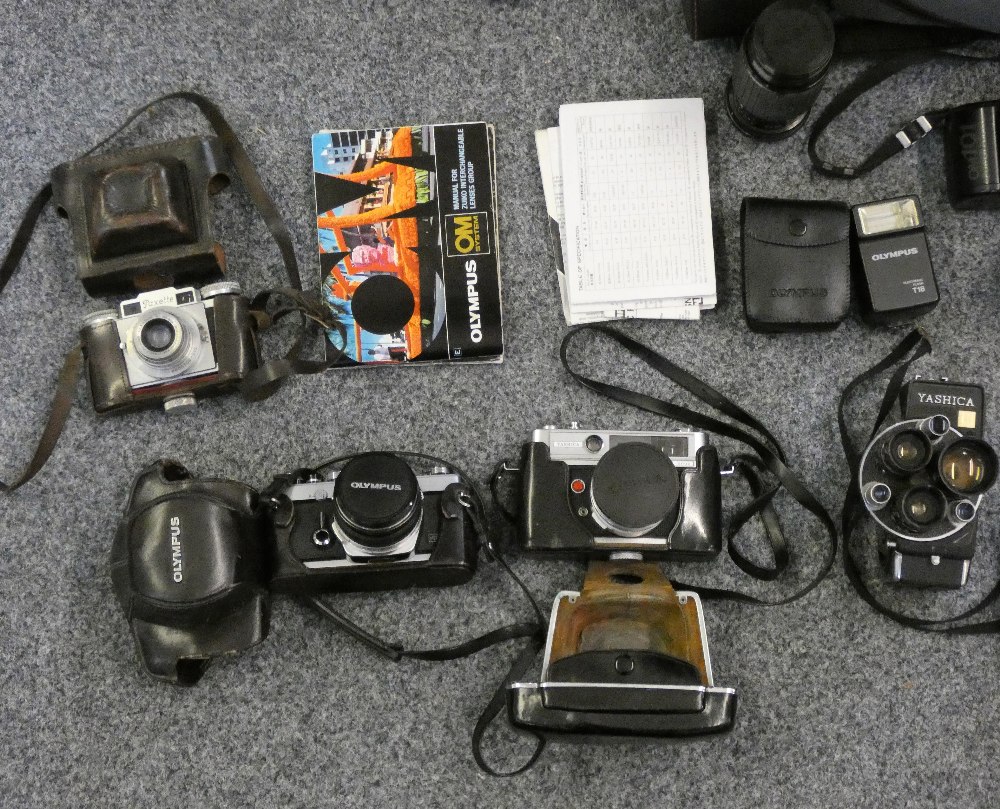 A collection of cameras together with a camera bag with Olympus camera and various lenses together - Image 3 of 3