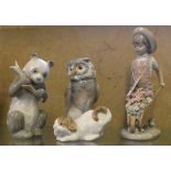 Lladro figure of child with wheelbarrow and three figures by Nao, owl, panda and dog (4)