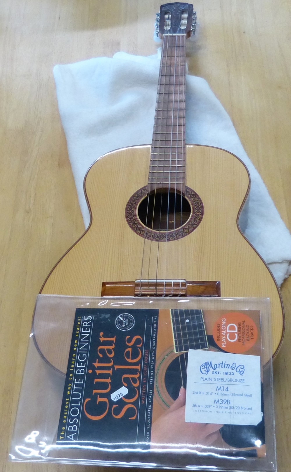 An acoustic guitar by Ginnini (Brazil)