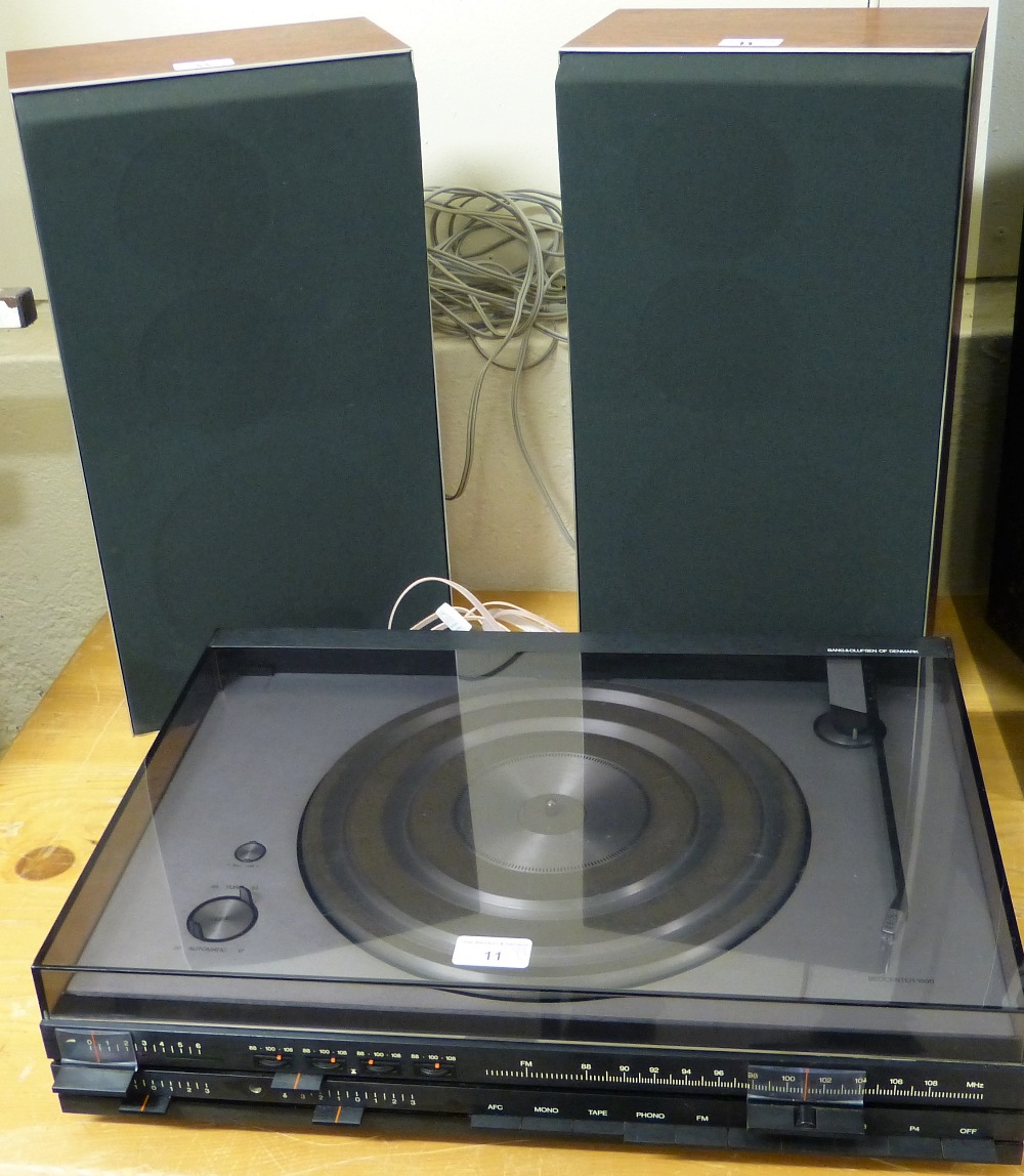 A Bang and Olufsen airlifted beocenter 1800 record player and radio together with a pair of Beovox