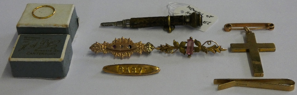 Four 9ct gold brooches, a tie clip, a cross pendant, 12 gms and other items.
