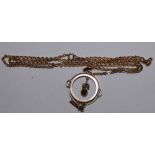 A 9ct gold peridot and half pearl openwork pendant, chain