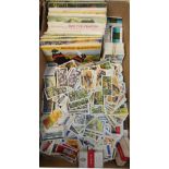 An extensive collection of cigarette cards/tea cards, to include; 1960 'Freshwater Fish' full book