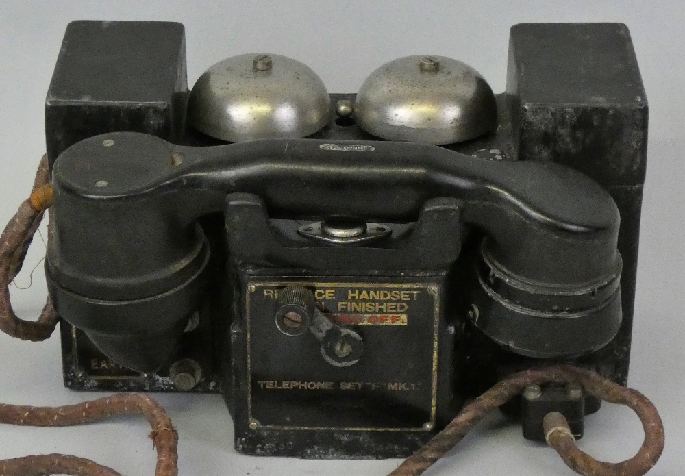 A 20th century 'Plessey Co. Ltd' field telephone set, model No. F MK1, in a blackened cast metal