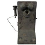 An early cased wall telephone, with inner mechanism, no visible makers mark, 56cm tall.