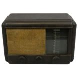 A Philco bakelite cased cabinet radio, c.1950, model No. AF8523, short/medium/long wave, 26 x 39 x