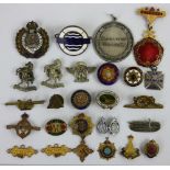 A collection of approximately 40 association lapel badges, together with civilian examples.