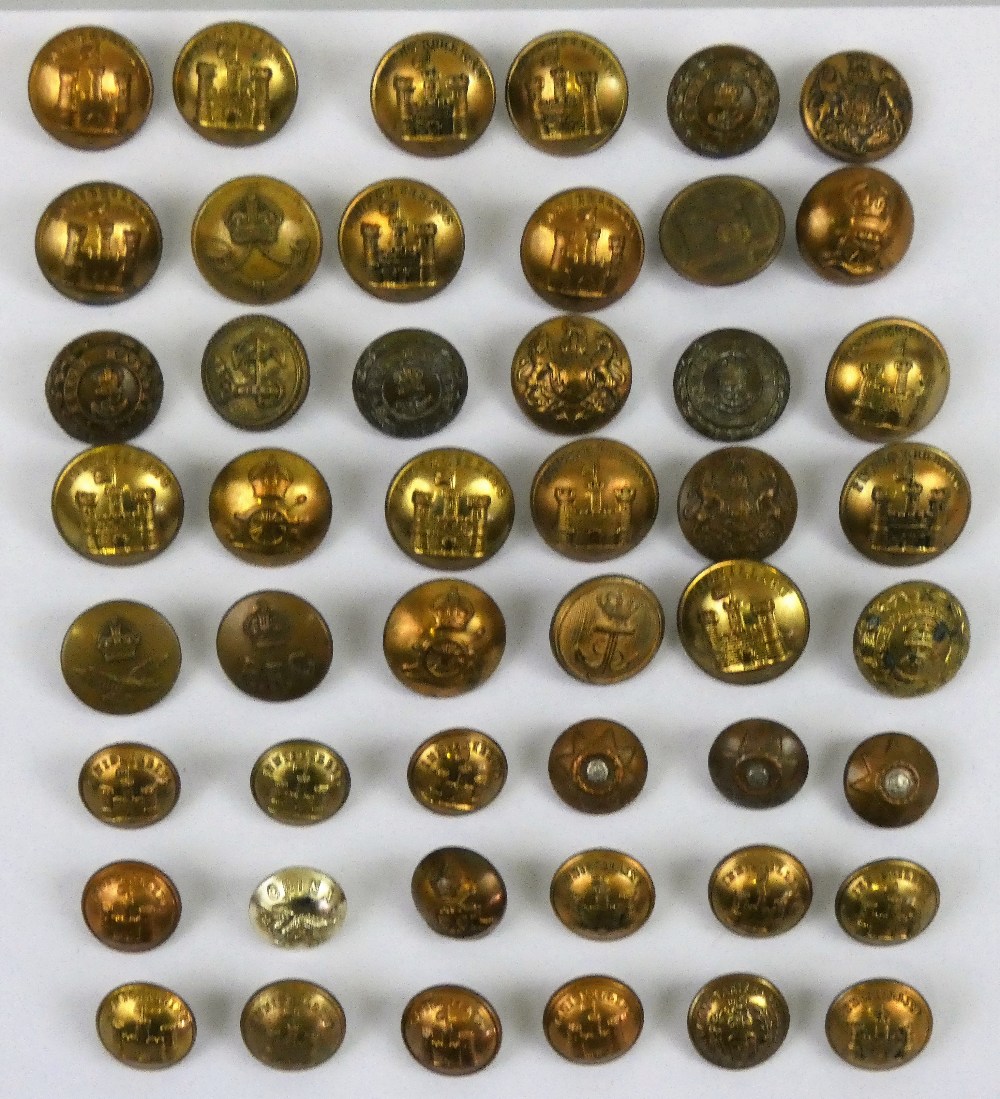 A collection of approximately 100 assorted military buttons.