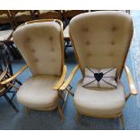 A pair of Ercol Windsor elm and beech armchairs, with stick backs, Ercol labels, with cushions