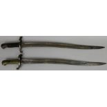 An 1853 pattern British artillery sword bayonet, together with an 1856 pattern British sword bayonet