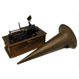 An Edison Home Phonograph in oak carry case with metal horn, bears makers label "Henry F. Scott -
