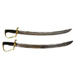 Two reproduction naval boarding cutlasses (2).
