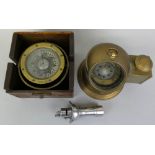 A gimbal mounted lifeboat compass by Bergen Nautik of Bergen Norway, 13.5cm diameter, mounted in a