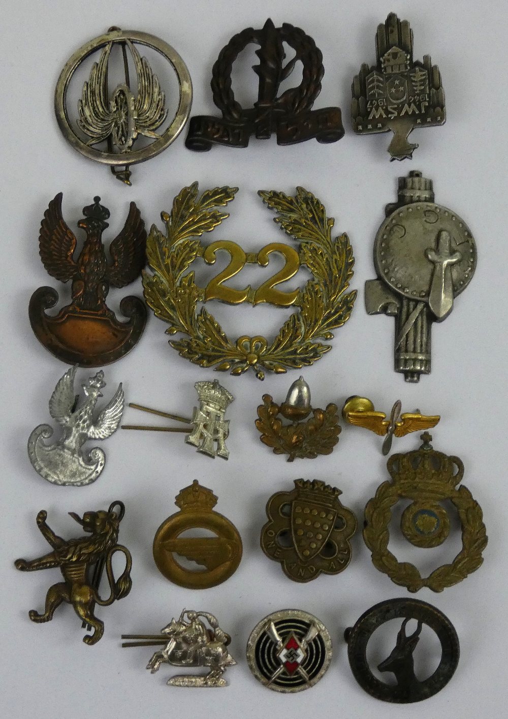 A collection of assorted non UK military badges, to include a Hitler Youth Snipers Badge.