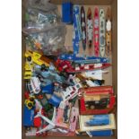 A box of die cast models including Matchbox 'Seakings', airplanes, etc., and a selection of