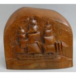 HMS Trin Comalee interest - a carved teak block of the vessel, height 23 cm, sold with certificate