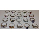 Twenty silver multi gem set dress rings