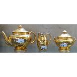 A Royal Worcester gilt, three piece tea service