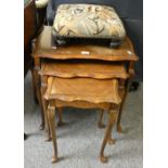 A mahogany nest of three tables together with footstool (2)