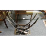 A glass topped console table on chromed base
