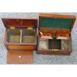 A mahogany tea caddy with brass fittings together with another mahogany tea caddy on raised feet (