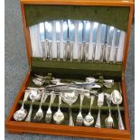 A yew wood canteen of cutlery