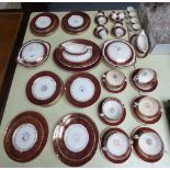 A Meakin dinner service including tureens, coffee cups, soup bowls, plates, oval platters, etc