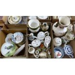 A box of collectors plates together with a box of floral ornaments, teapots, vases and a further box