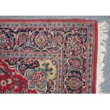 Multicoloured machine made wool rug, 213 cm x 141 cm