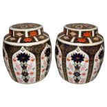 A pair of Royal Crown Derby large ginger jars with covers, Imari pattern number 1128, date code