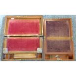A mahogany writing slope with brass bound corners together with a smaller mahogany writing slope (