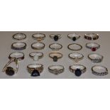 Twenty silver multi gem set dress rings