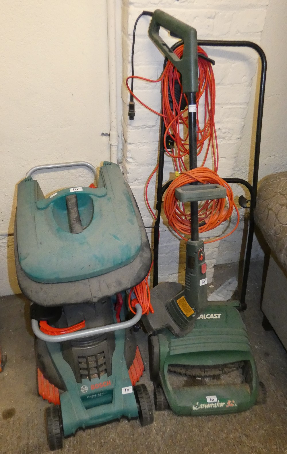 A Qualcast electric lawn rake, Bosch lawnmower and electric strimmer (3)