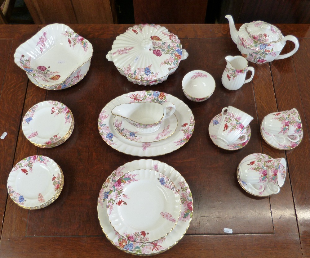 A Spode floral pattern six place dinner service including tureen, serving dish, tea pot, milk jug,