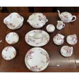 A Spode floral pattern six place dinner service including tureen, serving dish, tea pot, milk jug,