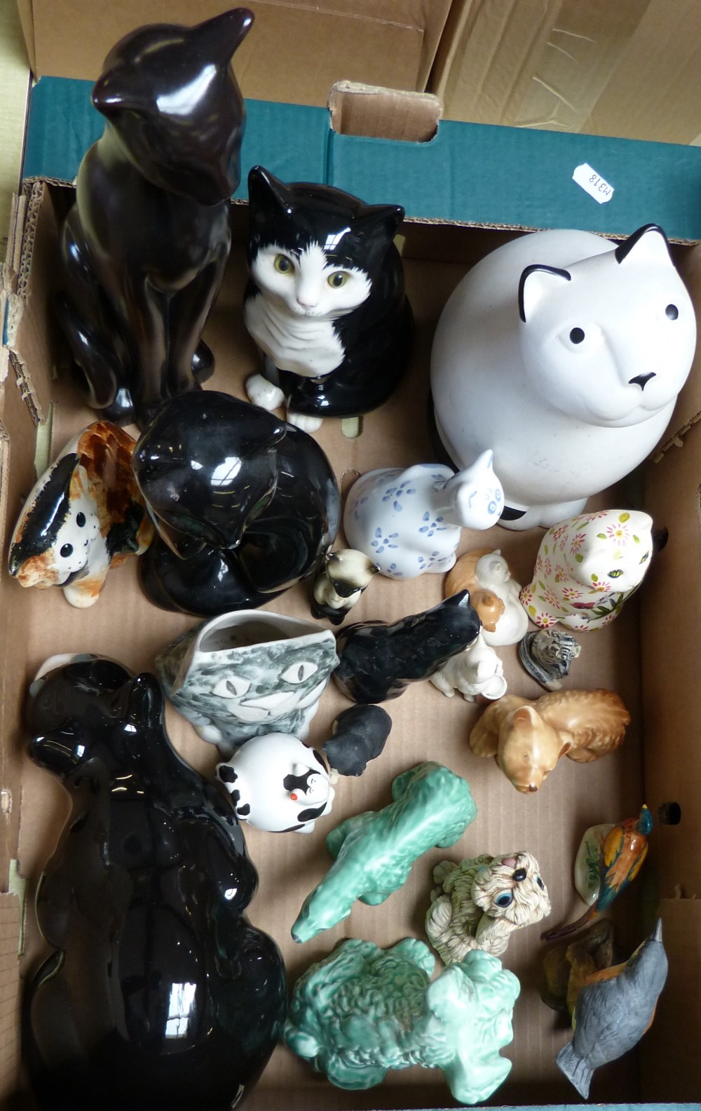 A box of mainly cat figures but also including Sylvac pieces, acorn, and bird. Together with another