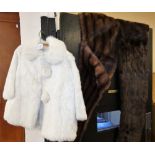A ladies small white fur jacket together with two fur stoles (3)