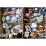 Three boxes of ornamental tea pots together with two Royal Doulton figurines, 'Dawn' HN3600, '