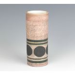 A Troika St Ives Pottery cylindrical vase with geometric decoration on a brown ground decorated by