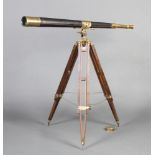 W Ottway & Company Ltd Ealing London, a Victorian 2 draw brass and leather telescope, raised on a