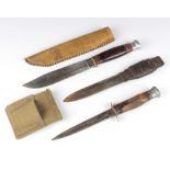 Wade and Butcher, a bowie style knife, the blade marked Pioneer with 17cm blade and scabbard, a