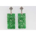 A pair of carved jade emerald and diamond ear drops in the Art Deco style