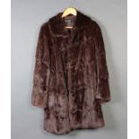 A lady's dark mink quarter length fur coat by Harrods