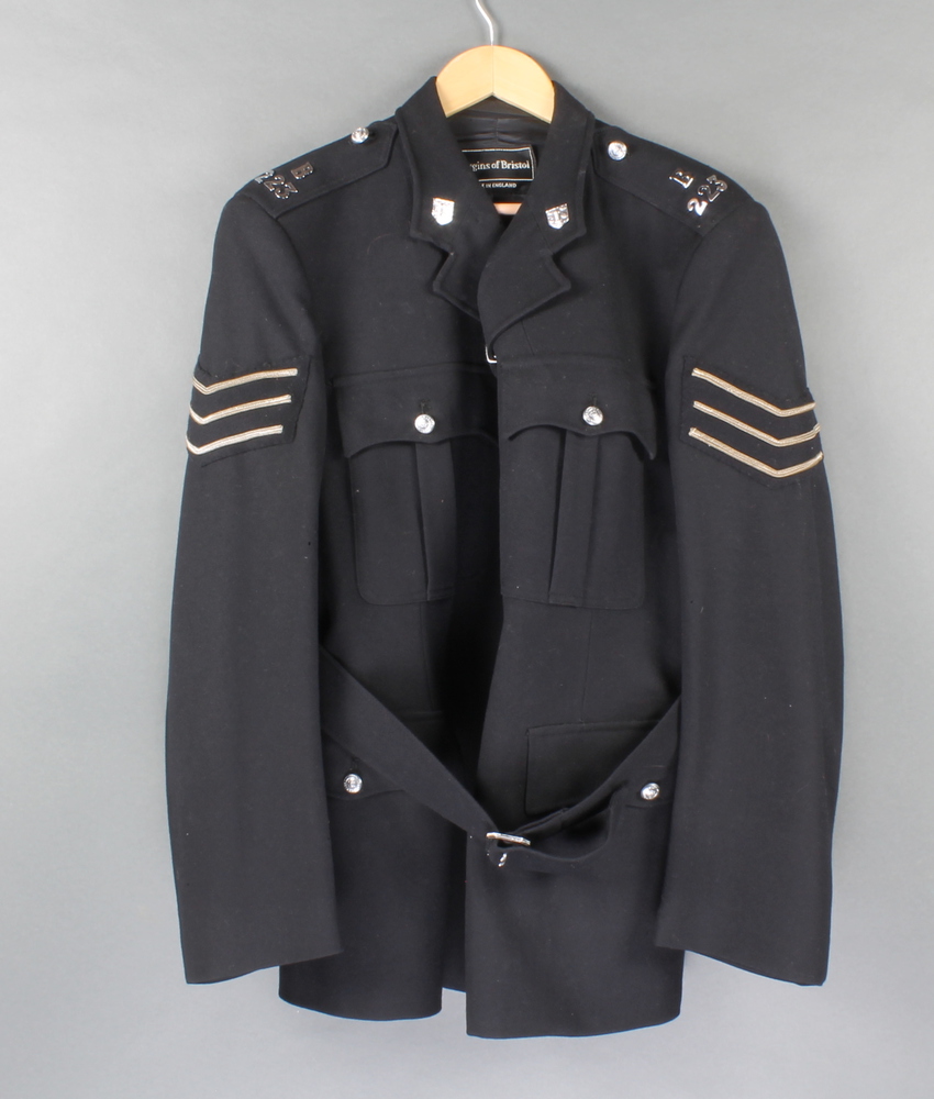 A Sussex Constabulary Police Sargent's tunic by Huggins of Bristol, collar no. B223, some moth to