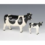 A Beswick Friesian cow CH.Claybury Leegwater no.1362A black and white gloss, 11.9cm together with