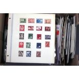 A collection of mint and used world stamps on sheets